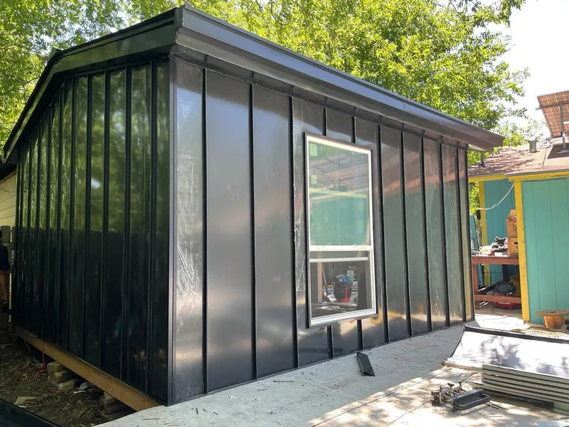 Black standing seam metal wall panels for Roof Inspection in Bensenville